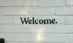 A sign that says welcome 