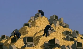 bankers sifting through gold coins and old computers 