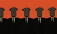 scruffy robots in a row, wearing suits 